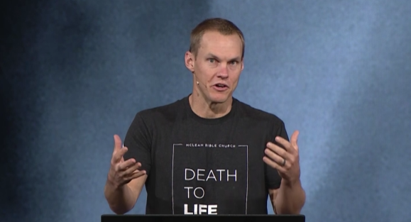 David Platt speaks at a podium.